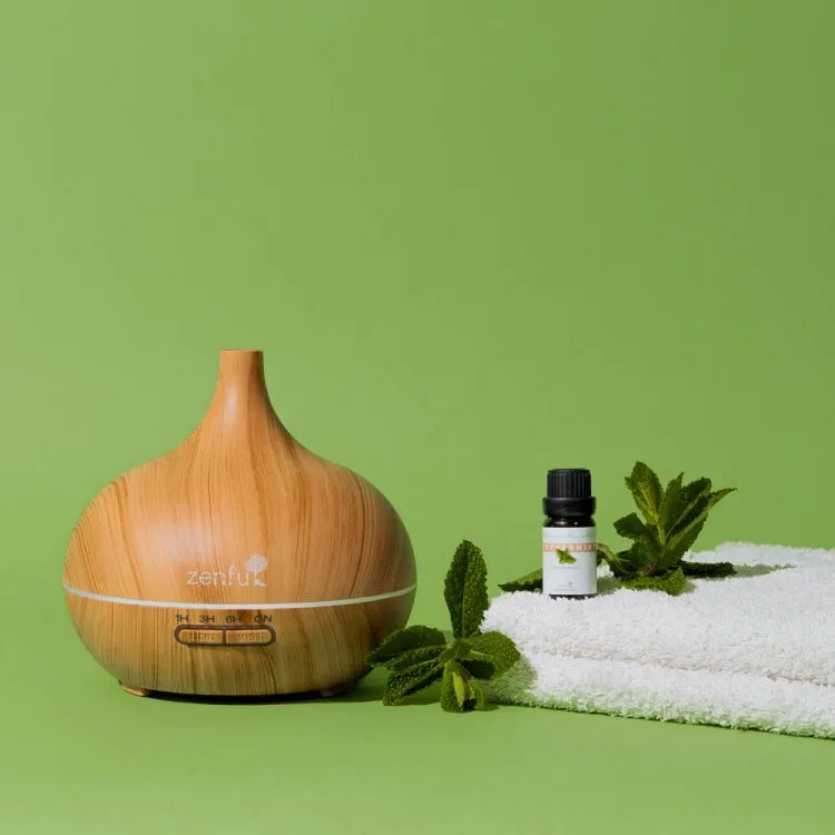 Zenful Pepermunt etherische olie op baddoek met Dewdrop licht hout diffuser